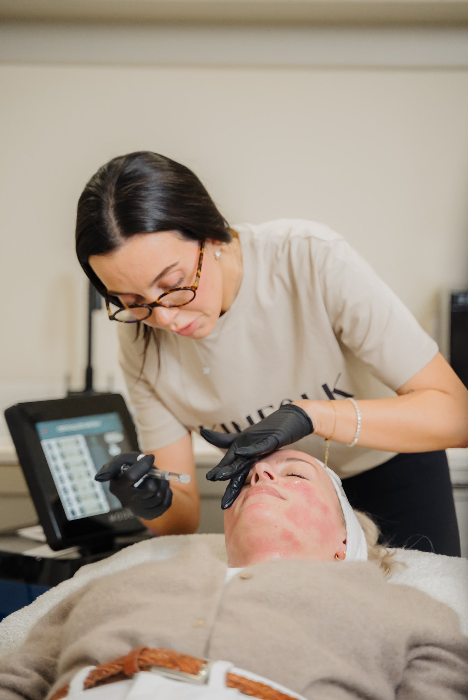 Anti-wrinkle injection treatment performed by medical practitioner to smooth facial lines
